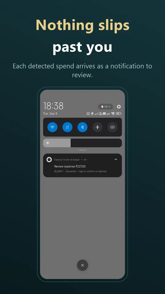 Notification asking to review a detected expense